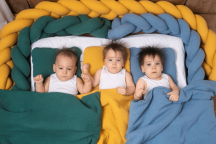 Ochraniacz do łóżeczka – czy warto go mieć?
